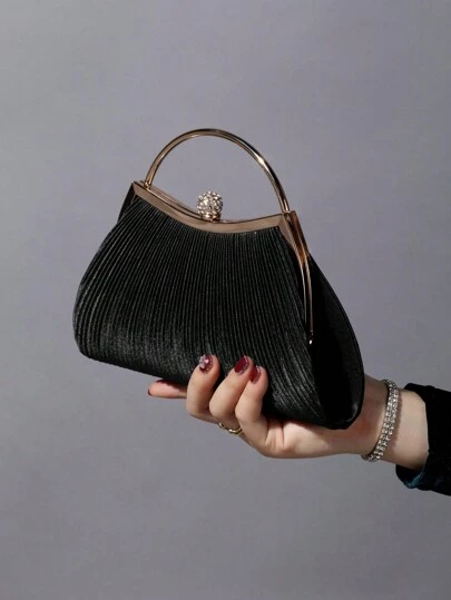 REMANLAND 这款闪耀夺目、优雅迷人的单颗水晶点缀时尚金属手拿包/晚宴包，适合女士出席派对、婚礼、盛会及其他场合。这款晚宴包是派对女孩和女士的理想之选，也是馈赠女性的完美礼物。