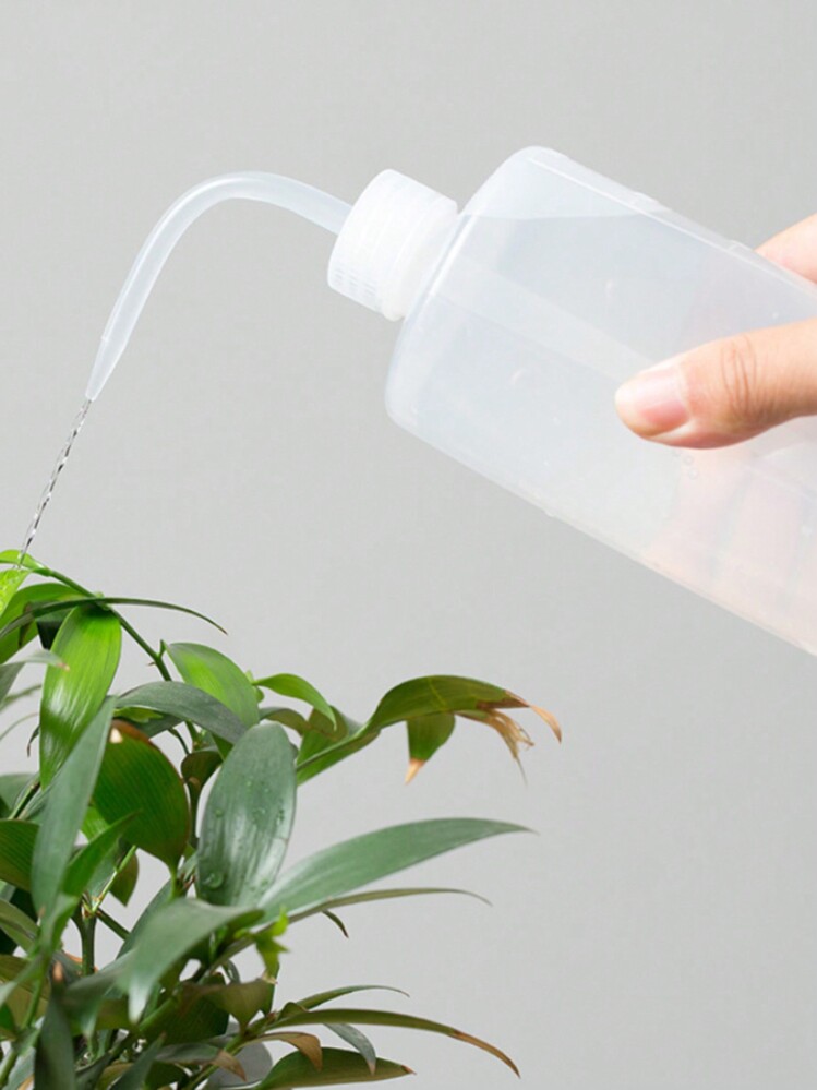 1个500毫升浇水壶，适用于圣诞树、室内植物、多肉植物、仙人掌等。塑料材质，带刻度，挤压式设计，是浇灌室内植物和花卉的理想之选，也是生日、毕业、圣诞节、冬季房间装饰和家居圣诞礼物的完美选择。 - 白色 - 查看 3