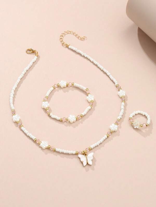 Set de 3 piezas de collar, pulsera y anillo con cuentas y diseños de flores y mariposas para niñas