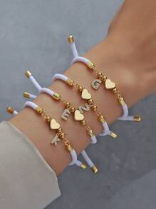 1 pièce Bracelet pour femmes de 4 couleurs A-Z Initiale 26 Lettre Cœur Couleurs de plage Bracelet corde réglable Cadeau de bijoux pour la Saint-Valentin