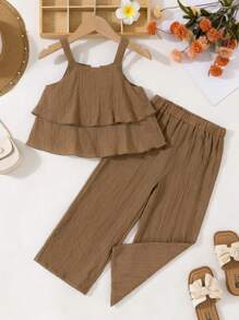 少女雙層蕾絲夏季無袖上衣搭配寬腿褲，休閒兩件套裝