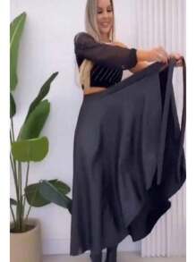 Saia feminina envelope couro fake, estilo moda tendencia 2024 - Preto - Visão 4