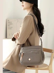 1个女士多层单肩包，大容量防水尼龙斜挎包，女士休闲手机袋