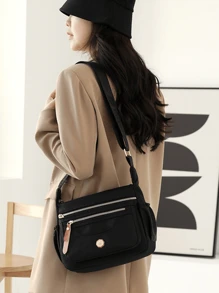 1个女士多层单肩包，大容量防水尼龙斜挎包，女士休闲手机袋