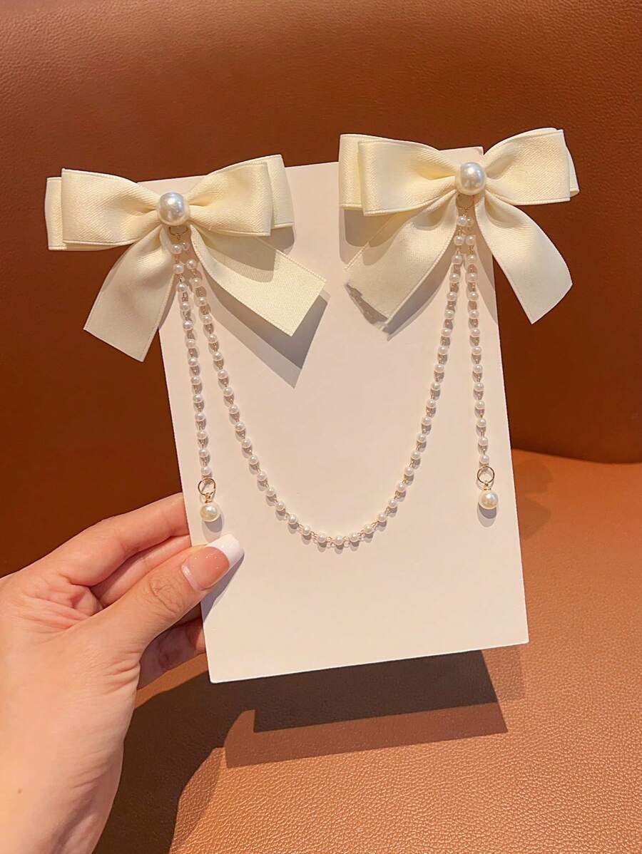 1pc Girls' Fashionable Sweet Pearl Bowknot & Tassel Hair Clip, Minor