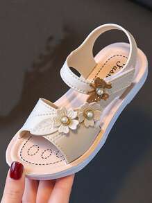 1 par de sandalias con adornos de flores lindas para niños, zapatillas de playa blancas para niñas con punta abierta, adecuadas para el verano