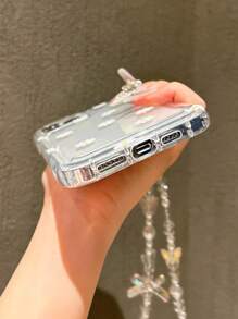 Étui de téléphone à fleurs de marguerite mignon compatible avec 14 Pro Max, 13, 12/12 Pro, 11, 15, 15 Pro Max, 16, 16 Pro Max, 17 Pro Max, avec un cordon blanc en forme de cœur de papillon, et design