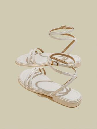 女士黑色平底交叉露趾系带凉鞋，夏季鞋，带扣平底沙滩凉鞋