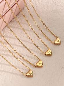 A Minimalist Necklace With A Small Heart-Shaped Letter Pendant, Made Of Stainless Steel And Plated With 18k Gold. Mini Necklace With Heart-Shaped Letter Pendant. - Letter Heart Necklace - View 11