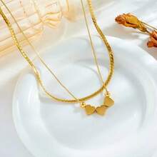 1入金色不銹鋼飾品三色心形項鍊，法式復古風格時尚舒適女性日常或街頭派對節日配飾