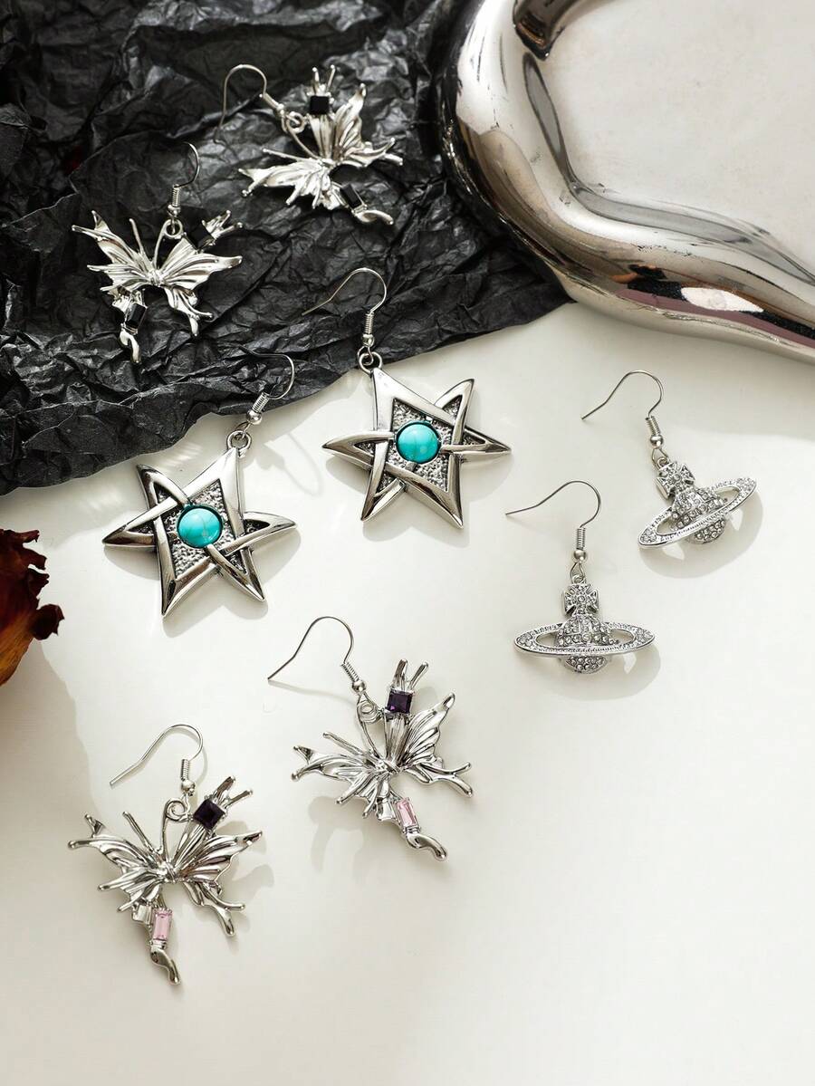 1 par de aretes colgantes plateados con el planeta Saturno y piedras de diamante de imitación, aptos para uso diario - pendientes de saturno - Ver 1