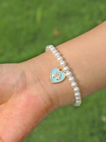 1 pieza de pulsera elástica con bolita de perlas blancas elegante y colgante de dije de corazón y lazo de moda - Regalo perfecto para chicas - Pulsera de perlas con lazo - Ver 3