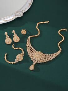 4 pièces/set Ensemble de bijoux de luxe haut de gamme comprenant un collier, un bracelet, des boucles d'oreilles et une bague avec des pendentifs en forme de larme en zircone plaqués or. Accessoires de robe de mariée et de fête. Cadeau fastueux pour la Saint-Valentin.