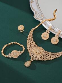 4 pièces/set Ensemble de bijoux de luxe haut de gamme comprenant un collier, un bracelet, des boucles d'oreilles et une bague avec des pendentifs en forme de larme en zircone plaqués or. Accessoires de robe de mariée et de fête. Cadeau fastueux pour la Saint-Valentin.