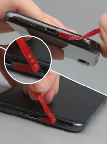 Kit di pulizia per telefoni cellulari 9 pezzi: nastro adesivo, spazzola per porto di ricarica, pulitore per foro audio, spazzola per la pulizia di fessure, panno per la pulizia, tappi antipolvere in silicone