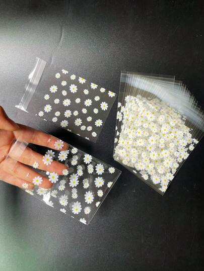 50个可爱清新小雏菊图案礼品包装OPP自封袋，白色花朵印花小礼品卡包装透明装饰袋。适用于派对、节日或促销文具礼品包装。圣诞节