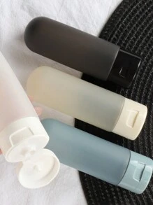 4个防漏挤压瓶，适用于洗发水、护发素、润肤露和沐浴露，配有收纳袋，方便旅行携带洗漱用品 - 2.03盎司可重复灌装化妆品容器，旅行必备，旅行收纳，适用于海滩、暑假、返校、假日露营、假日用品、迷你香水（男女通用）、旅行配件、旅行必备品、学习用品、返校用品 - 彩色 - 查看 5