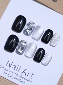 Uñas postizas 100% hechas a mano, 10 piezas de puntas de uñas cuadradas cortas reutilizables en negro con efecto ojo de gato lunar y pedrería blanca con brillo. Encantos de uñas falsas para uso diario, diseño de uñas de fiesta y suministros de uñas uñas falsas uña falsa uña acrílica