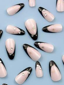 用按压式指甲提升你的造型，24片中号杏仁形指甲，镶嵌3D闪亮钻石，包含1片粘合片和1个迷你锉刀，银色星爆图案搭配黑色法式全覆盖假指甲套装，适合女性和时尚女孩约会派对的美甲。这款永远不会过时。假日旅游搭配。美甲用品 指甲 - 彩色 - 查看 3