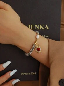 1件创意时尚个性化设计优雅轻盈奢华铜镶嵌锆石不对称水滴心形串珠养殖珍珠手链，适合女性、姐妹、情侣、毕业礼物，也是情人节、日常聚会、节日、圣诞节的理想之选。