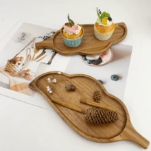1 khay gỗ keo, khay khai vị, khay tráng miệng, khay trái cây, khay kẹo, khay sushi, khay ăn nhẹ, khay trang trí, khay gỗ đa năng. Thích hợp cho việc họp mặt gia đình, đồ dùng nhà bếp, khay trang trí, khay chính. Khay thiết kế hình chiếc lá cổ điển và đẹp mắt là món quà tuyệt vời cho các lễ hội, đám cưới, quà tặng cô dâu, lễ kỷ niệm, tiệc tân gia, sinh nhật. - Màu vàng - Xem 2