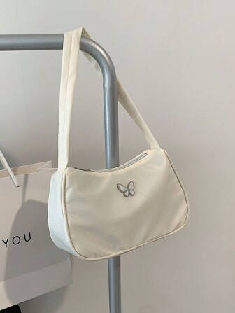 Bolso de hombro blanco nuevo 2024, elegante moda con decoración de mariposa metálica, bolso ligero y versátil, fresco y estiloso bolso de niña para calle y fotografía bajo el brazo