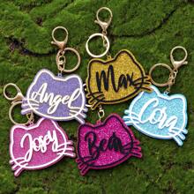 客製化可愛貓頭元素設計鑰匙扣，紀念生日禮物，驚喜禮物，寵物貓名紀念禮物，學校用品老師禮物返校學生禮物，老師配件 - 紫色 - 查看 6