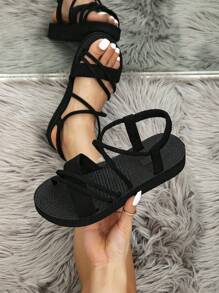 Women's Fashion Black Flat Shoes With Elastic Strap And Elegant Cross Band