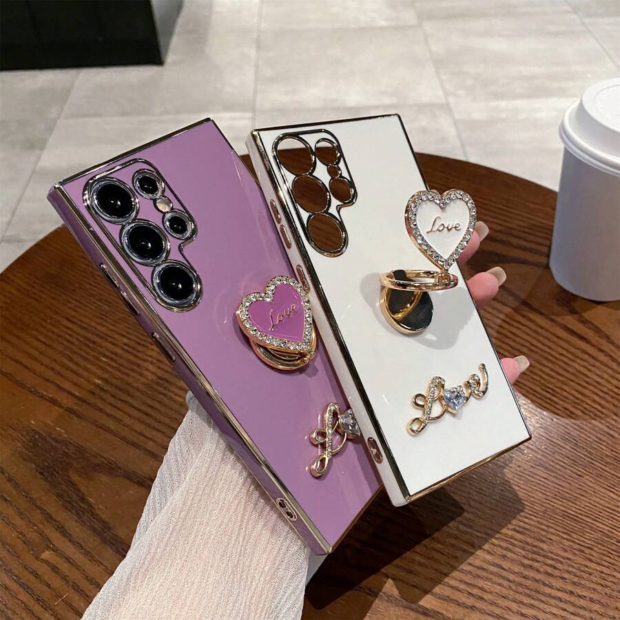 DIY Rhinestone Encrusted + Rhinestone Heart + 360° Rotating Foldable Holder, Compatible With Infinix Zero 30/TECNO Spark GO 2024 Series, POCO/POP/CAMON/SMART Series, IPhone 11/12/13/14/15 Pro Max, Samsung S22/23/24, OPPO, VIVO, Moto G, Redmi Note 13C/12/11 Pro, Enjoy 20/30/40/50/60/70, HONOR 90/80/70/60/50, X9/X8/X7/X6/X5AB, All-In-One Anti-Fall Electroplated Phone Case - Black - View 1