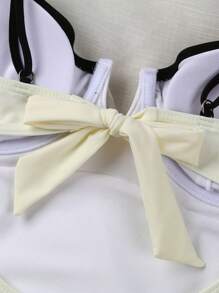 Traje de baño de una pieza con escote en V sexy y bloques de color de la marca Polovedo