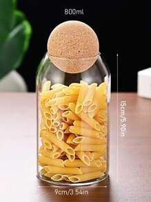 1 个带盖玻璃储物罐，用于存放谷物、茶叶等。返回学校