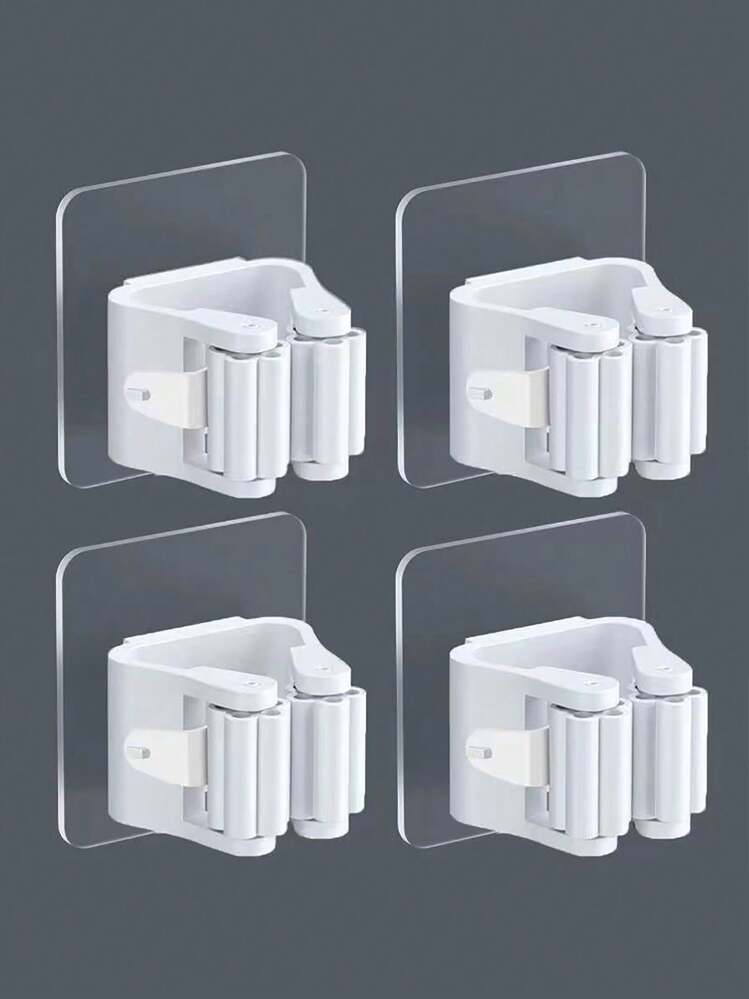 4 قطع من معلقات المكانس عالية القوة المتعددة الوظائف بدون ثقب للتركيب على الحائط، رف تخزين المجوزة مقاوم للماء، معلق للفرشاة، مُشبك لتخزين أدوات الحمام، خطاف للحمام، إكسسوارات حمام، مناسبة لوضع المكنسة والفرشاة وأدوات التنظيف في الحمام والحقيبة والمنظم والتخزين والمطبخ - أبيض - مشاهدة 1