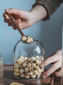 1 个带盖玻璃储物罐，用于存放谷物、茶叶等。返回学校