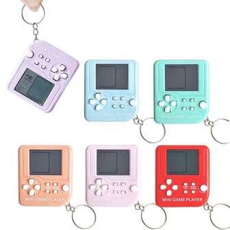 1 pieza Consola de videojuegos retro portátil y mini para niños como decoración navideña con llavero, juguete electrónico que evoca los recuerdos de la década de los 80-90 con múltiples juegos clásicos incorporados, juguete ideal para regalos de fiesta navideña para niños y niñas