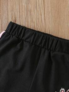 Conjunto casual de verano de 2 piezas para niñas jóvenes (de 1 a 6 años) con camiseta de manga corta linda con impresión de ojos grandes de gato y pantalones cortos con huellas de patas de gato - Rosa - Ver 5