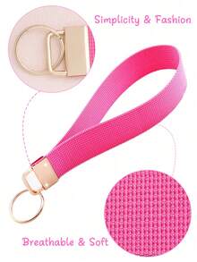 1 pièce Porte-clés de poignet rose avec lanière pour clés, porte-clés avec anneau de clé, sangle courte mignonne pour porte-cartes d'identité, portefeuille, téléphone portable, accessoires de porte-clés à la mode, excellent cadeau pour femmes, épouse, petite amie, et amie intime.