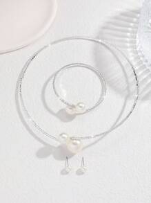 Conjunto de 4 piezas de accesorios de boda de tono dorado con perlas falsas, diamantes de imitación y collar de tachuelas con colgante de circonita cúbica ajustable, gargantilla, brazalete y aretes con elementos de baile
