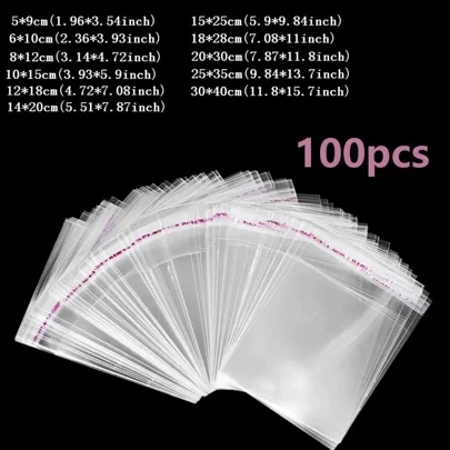100pcs/Pack, OPP Clear Dust-Proof Self-Adhesive Plastic Bags, Over 10 Size Options, Suitable For Packaging Small Jewelry, Baked Goods, Keychains, Pendants, Cards, Holiday Gifts, Also Can Be Used As Transparent Storage Bags, Packaging Bags, Gift Bags.