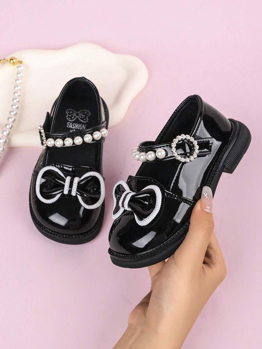Giày công chúa thời trang cao cấp cho trẻ em, mũi giày phản quang, đế chống mòn, nhẹ, mềm mại và thoải mái, thiết kế nơ thoáng khí - màu đen - Xem 1
