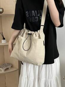 Geantă din material lejeră, de mare capacitate, elegantă, cu închidere cu șnur, curea lată și design de toc pentru școală, navetă și cumpărături