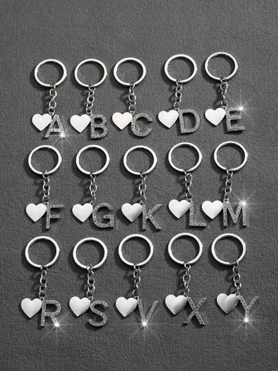 1 pezzo Portachiavi alla moda in lega di stile europeo e americano, con design traforato a forma di cuore, con lettere inglesi incrostate di strass, accessorio pendente per borse, uomo e donna, souvenir, accessori per auto, ciondolo per zaino, idee regalo natalizie goth Y2K, accessori per borse, cordini con porta badge, accessori per auto