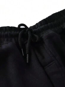 Pantalones de Chándal Ajustados con Bolsillos y Cintura Elástica: Ideales para Correr y Deportes al Aire - Negro - Ver 6