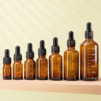 1 יחידת בקבוקי טפטפת עם קנה מידה 5 מ"ל-100 מ"ל מגיב טיפת עיניים אמבר זכוכית ארומתרפיה בקבוק פיפטה נוזלי בקבוקים ניתנים למילוי חוזר