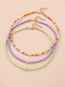 Set da 3 collane da ragazza con perline a forma di stelle, lune e cuori, adatte per vacanze, abbigliamento casual, e decorazione quotidiana