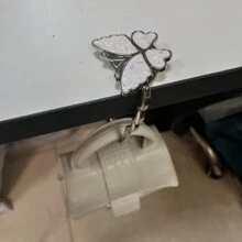 1 pieza Gancho plegable con forma de mariposa, se puede usar como colgador de billetera, adecuado para escritorios, mesas, oficina en casa - Blanco - Ver 9