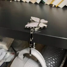 1 pieza Gancho plegable con forma de mariposa, se puede usar como colgador de billetera, adecuado para escritorios, mesas, oficina en casa - Blanco - Ver 7