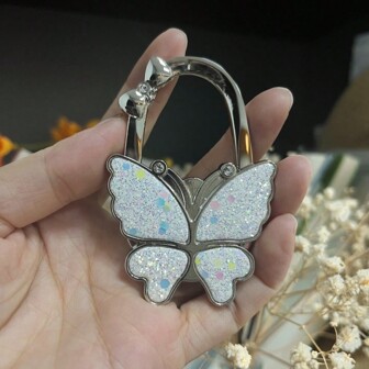 1入摺疊掛鉤閃亮蝴蝶造型掛鉤，可用於桌子、辦公桌、家庭的手提包掛鉤