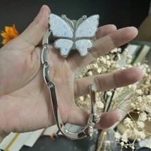 1 pieza Gancho plegable con forma de mariposa, se puede usar como colgador de billetera, adecuado para escritorios, mesas, oficina en casa - Blanco - Ver 4