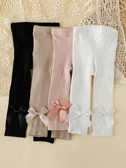 4入組寶寶女孩基本款九分褲袜，配有蝴蝶結裝飾，適合全年日常穿著