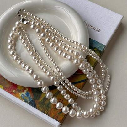 Elegante collar de perlas falsas de color crema, adecuado para uso diario